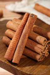 Natural Guangxi Cinnamon Sticks on Wooden Board - Organic Spice Ingredients for Cooking
