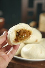 Handmade Pork Buns with Scallion Filling - Traditional Asian Steamed Dumplings Close-up Picture