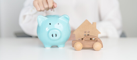 Piggy bank with car and Home model. Car loan, Interest rate, real estate, house, Insurance, Financial, Repair, Tax, mortgage and Maintenance