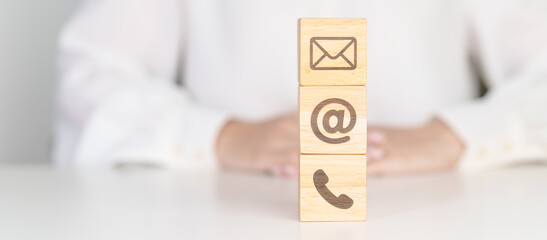 Contact Us concepts. Wood block of Email, call Phone and Website Address sign. For Customer support hotline, business Marketing, Corporate, communication and Advertising