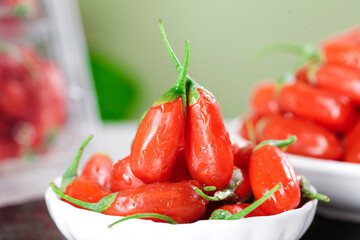 Fresh Red Goji Berries Wolfberries from Ningxia China in White Bowl Healthy Superfood Antioxidant Fruit
