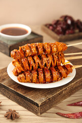 Traditional Shaanxi Spiced Grilled Gluten Skewers - Homemade Chinese Street Food on Rustic Wooden Board