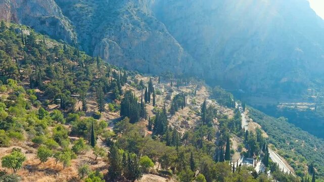 Delphi, Greece. Ruins of the ancient city of Delphi. Sunny weather in the morning, Summer. Drone footage