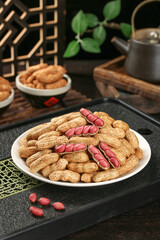 Fresh Red Skin Peanuts in Shell on Plate with Traditional Tea Setting - Raw Groundnuts Food Photography