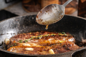 Beef steaks are pan-seared and topped with their own juices and sauce. High quality photo
