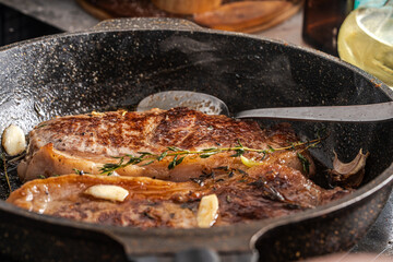 Beef stacks are pan-fried with rosemary and thyme. High quality photo