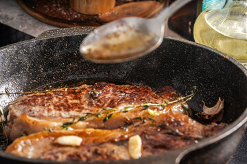 Beef steaks are pan-seared and topped with their own juices and sauce. High quality photo
