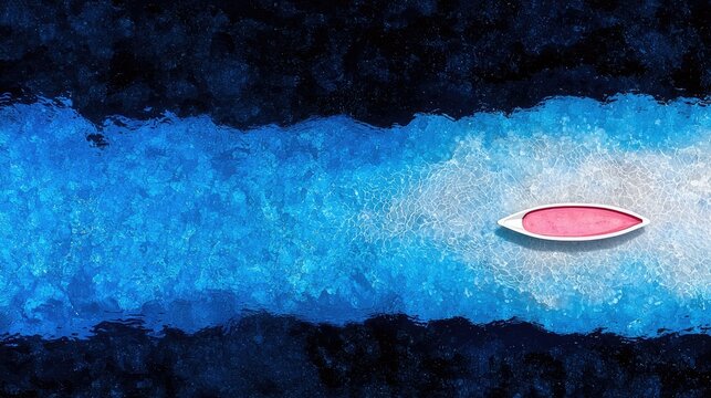 An aerial view of a white and pink canoe gently floating on a clear, bright blue body of water. The water has a textured, rippling surface, and the surrounding