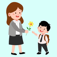 A smiling boy gives a teacher ayellow flowers as a gift.