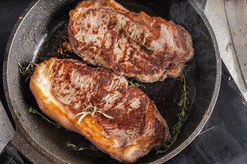 Beef stacks are pan-fried with rosemary and thyme. High quality photo