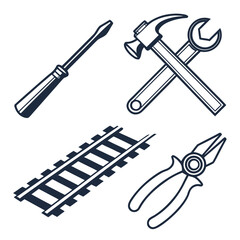 Collection of essential hand tools including a screwdriver, hammer, wrench, and pliers, alongside railroad tracks, isolated on