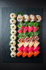 A vibrant sushi display with diverse flavors and textures for everyone to enjoy