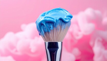 Brush with blue paint on pink background with beauty, makeup, art, cosmetic, and brushstroke.