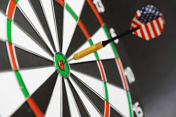 Dart Hits Bullseye on Classic Dartboard with Precision and Focus