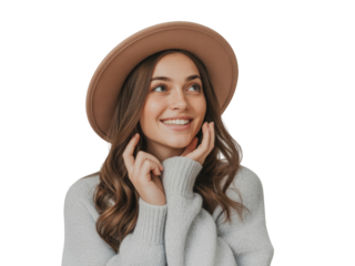 Young woman with hat and sweater smiling with hands on face, looking up. isolated on transparent background