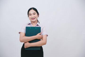 Smiling Professional Woman Holding Clipboard in Business Attire with Neutral Background for Corporate and Marketing Use