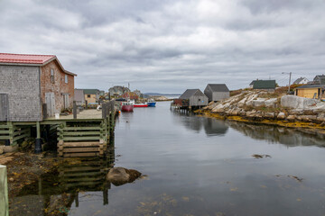 Charming and serene view of the historic fishing village of Peggy's Cove in Nova Scotia, surrounded by natural beauty and maritime heritage.
