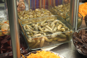 Variety of pickled vegetables and garnishes on display