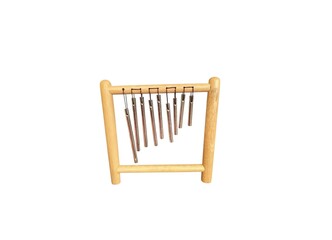 The white background in the picture is a wind chime or pipe bell, a traditional musical instrument that makes sound by knocking. It has a wooden frame and a beautiful silver bell hanging.