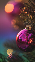 Hot Pink Christmas Ornament Close-Up with Soft Purple Bokeh and Copy Space