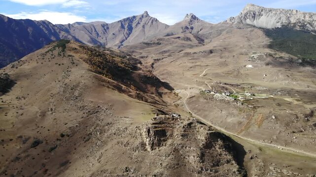 Aerial view of caucasus mountains and ancient village. Media