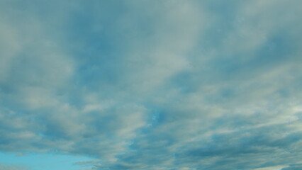 Dynamic Cloud Cover is Creating Stunning and Beautiful Patterns Over the Serene Blue Skies Above