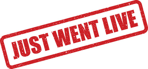 A textured rubber stamp with a prominent grunge effect displaying the phrase JUST WENT LIVE diagonally, signifying a new launch or release