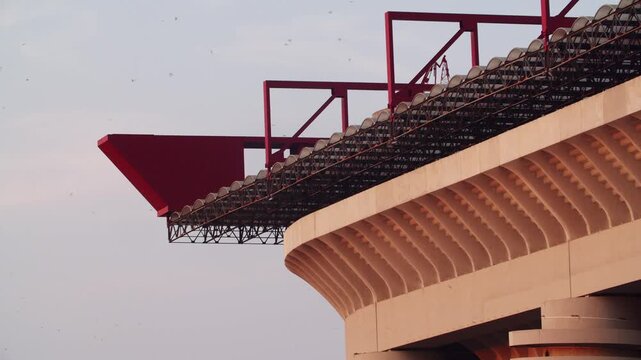 established drone aerial view of Milan&rsquo;s San Siro Stadium, highlighting architectural details and swallows
