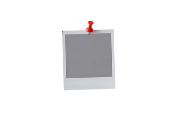 A vintage instant photo frame with a red thumbtack holding it up isolated on transparent background