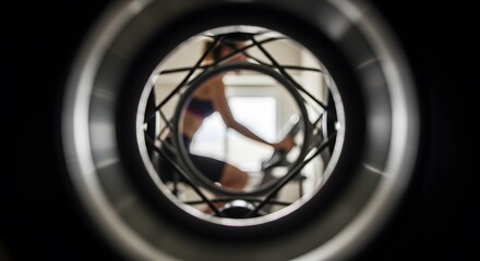Naklejka premium Abstract View of Woman Exercising on Stationary Bike, Indoor Fit