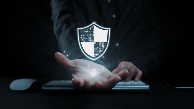 This image illustrates a digital security concept featuring a shield symbol, emphasizing the importance of data protection and cybersecurity in a technology-driven world. Qubit - Powered by Adobe