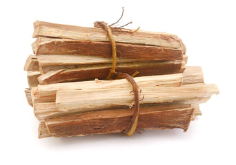 Stack of firewood on white