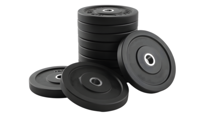 A stack of round black weight plates rests on a dark surface.