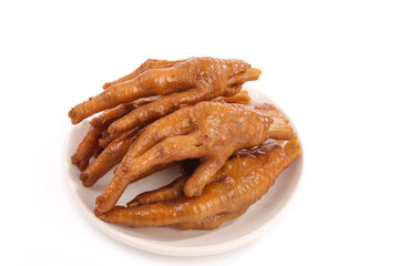 Spicy Marinated Chicken Feet in Sauce on White Plate - Traditional Asian Food Delicacy