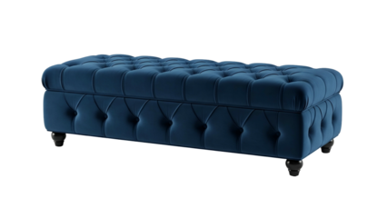 A plush, tufted, rectangular ottoman with dark blue velvet upholstery and black wooden feet