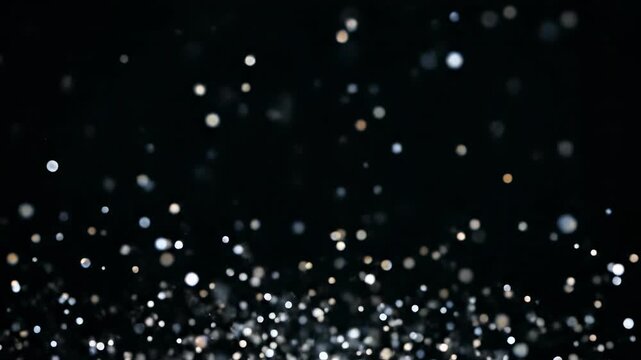 Glittering blue snowflakes and bright stars fall like rain drops against a dark winter sky in this shiny Christmas vector pattern design