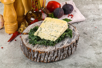 Blue cheese piece over board