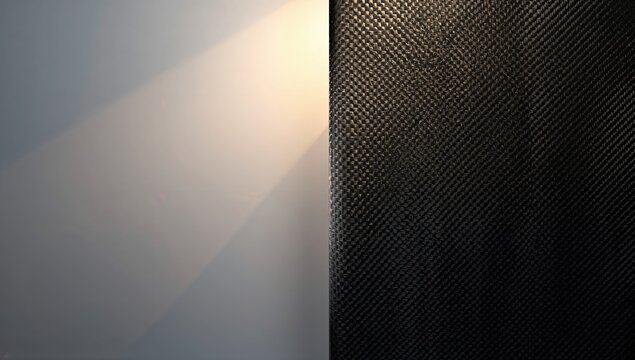 Black carbon fiber texture used as a background for UI design or editorial headers