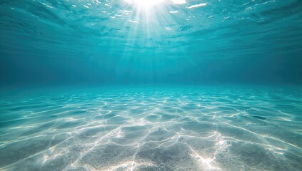 Natural Caribbean Sea setting with sunlight on shallow sandy floor, suitable for background or layout design