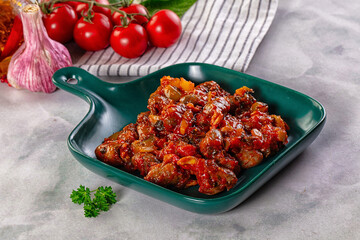 Roasted chicken hearts with vegetables