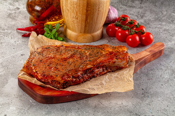 Raw marinated pork loin steak