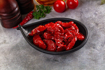 Tasty dried tomatoes in the bowl