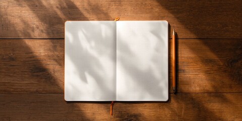 A sheet of dot grid paper on a wooden surface used for bullet journaling, suitable for layout planning