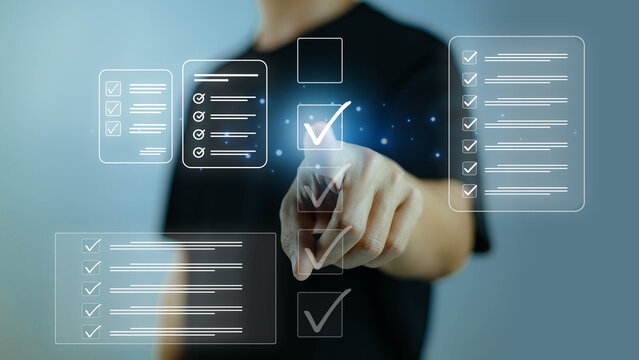 A person interacting with a digital checklist interface, highlighting task completion and workflow management, ideal for business productivity, organization concepts, and modern technology visuals.
