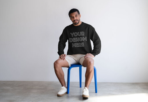 Mockup Of Man In Customized Sweatshirt, On Stool