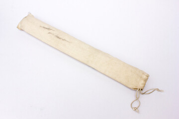 A canvas bag for a recorder flute, isolated on white background. 