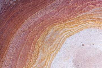 Abstrakte Textur der Erosionsschichten eines australischen Felsens