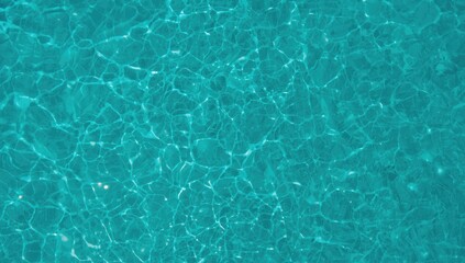 Obraz premium Aerial view of transparent sea water surface emphasizing clarity and natural blue hues, suitable for background use