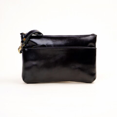Naklejka premium Elegant black leather pouch isolated on white background