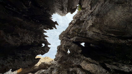 looking at the sky from inside the unusual hole